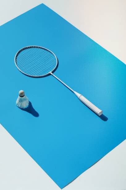 Canvas Print High angle view of badminton racket on table