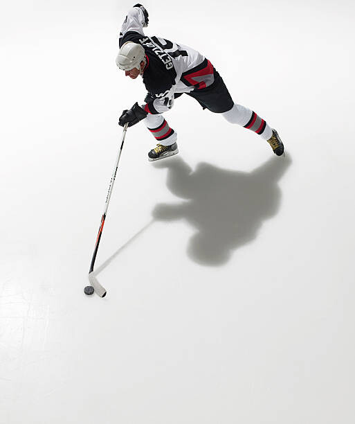 Canvas Print Ice hockey player in possession of puck