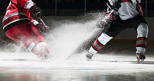Canvas Print Ice hockey players facing off