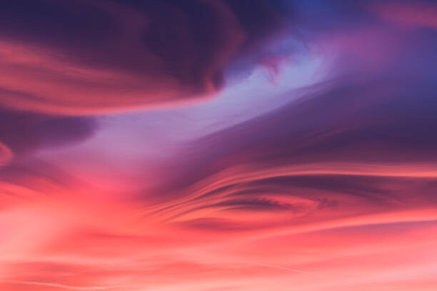 Canvas Print Moody lenticular clouds at sunset