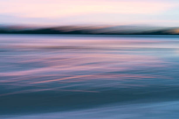 Canvas Print Motion blur effect in coastal sunrise