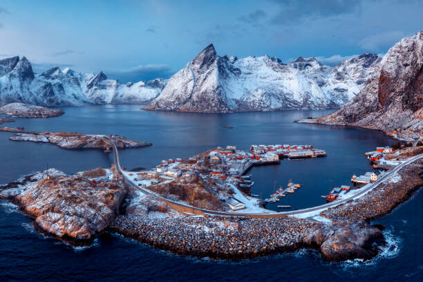 Canvas Print Road among winter scenery in Lofoten