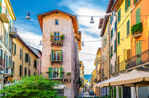 Canvas Print Traditional colorful building with balconies, shutter