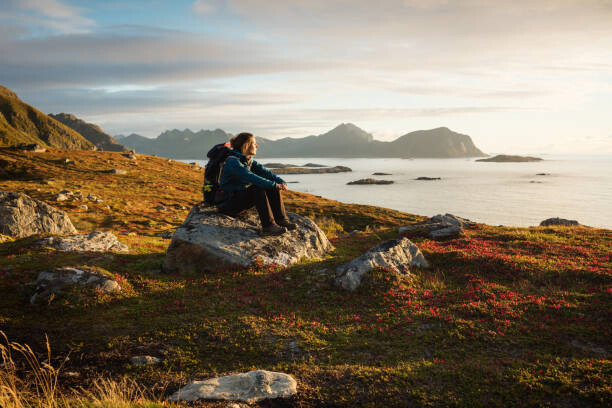 Canvas Print Woman enjoys the Norwegian countryside
