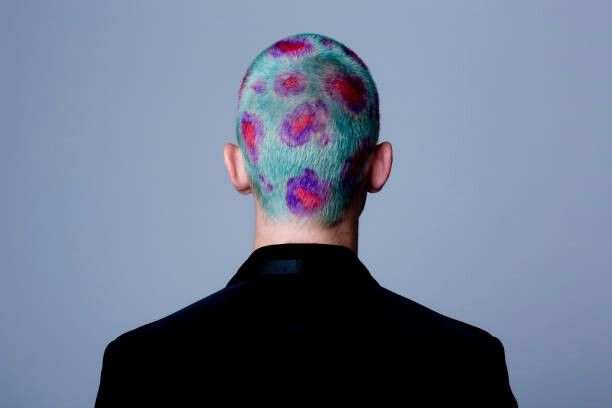 Canvas Print Young man with dyed shot hair studio