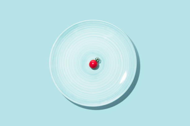 Juliste Small Cherry Tomato With Big Blue Plate