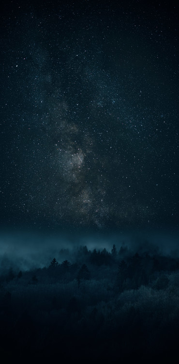 Art Photography Astrophotography picture of Bielsa landscape with milky way on the night sky.