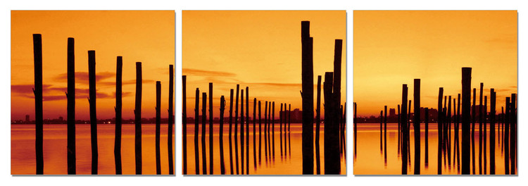 Golden sunset over pier Mounted Art Print