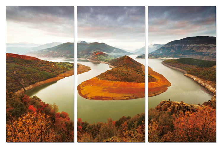 River flowing around a rock Mounted Art Print
