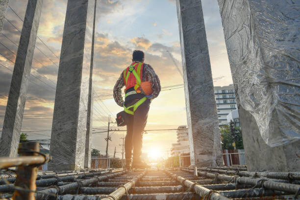 Murais de parede Working at height equipment on during sunset