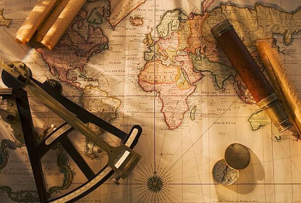 Camisola Octant, compass and telescope on nautical map