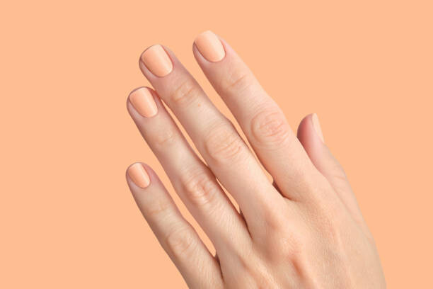 Plakat Manicure in the colors of the year Peach Fuzz.