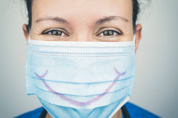 Plakat Portrait of Nurse with mask smiling