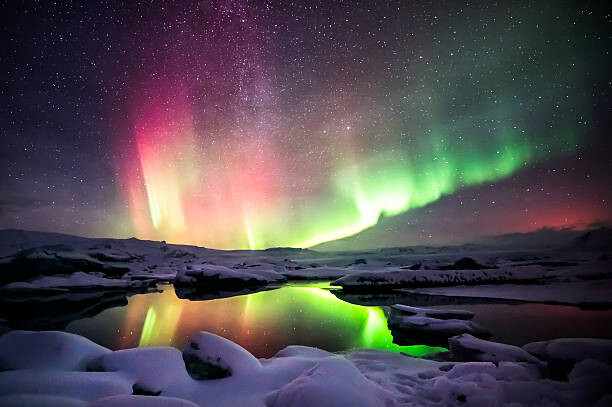 Poster Mixed aurora dancing over the Jokulsarlon