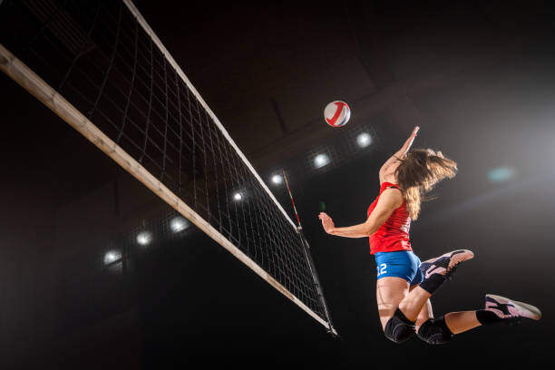 Poster Woman spiking volleyball