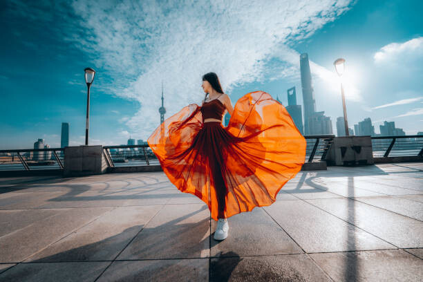 Poster Beautiful young woman in red skirt