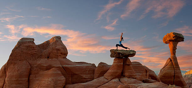 Poster Caucasian woman practicing yoga on top