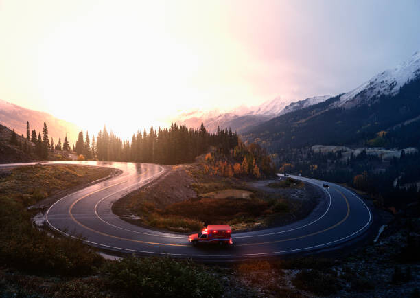 Poster Ambulance driving on winding remote road