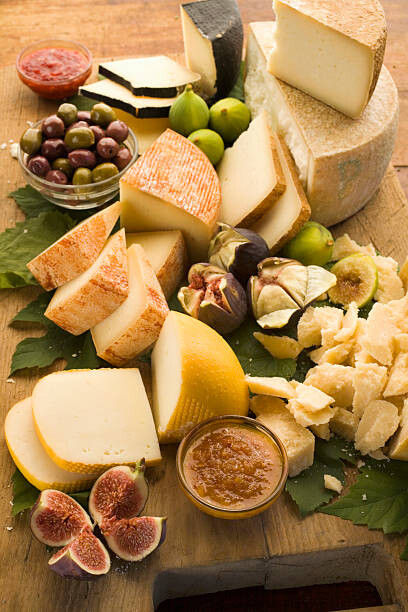 Poster Assorted Italian cheese with figs and olives