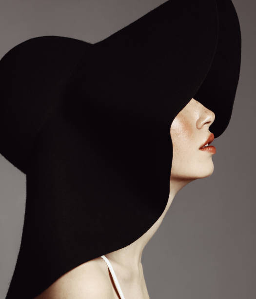 Poster Beautiful elegant woman with hat