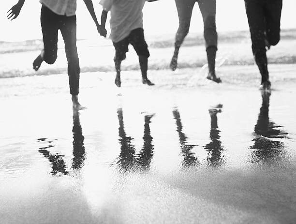 Poster Family running on beach