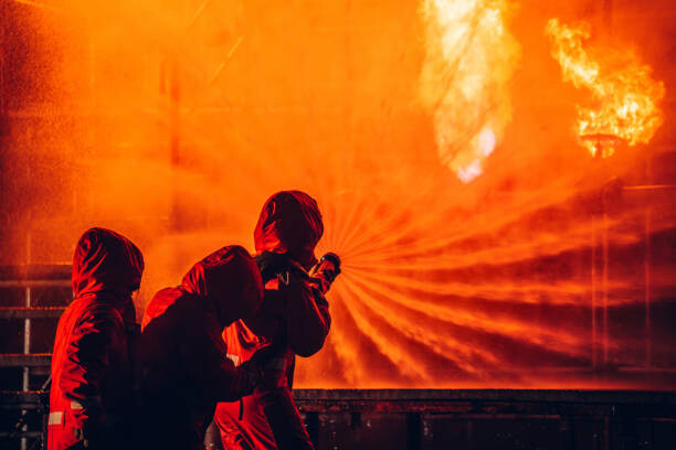 Poster Firefighters Battling Blaze with Water