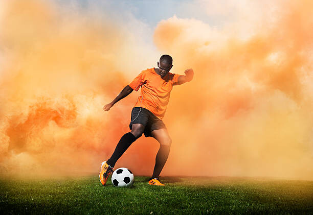 Poster football player in orange smoke