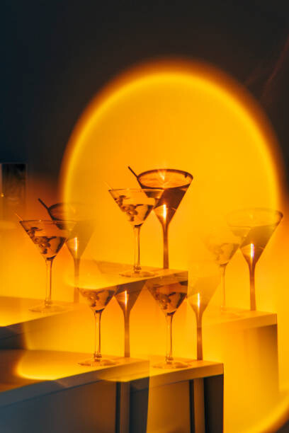 Poster Kaleidoscope martini cocktail in orange neon