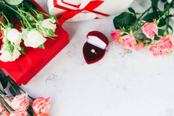 Poster Ring with diamond among bouquets of