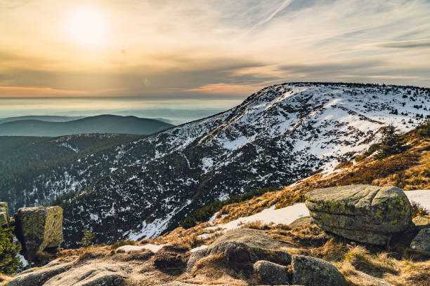 Poster Scenic view of snowcapped mountains against