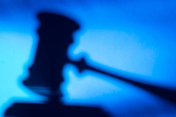 Poster Silhouette of a judge's gavel. Cryptocurrencies