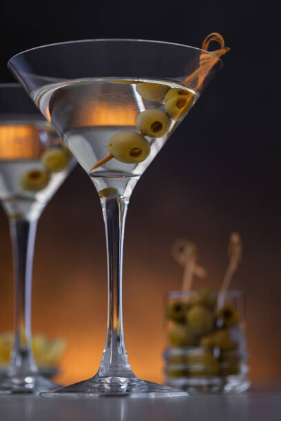 Poster Two glasses of martini with olives