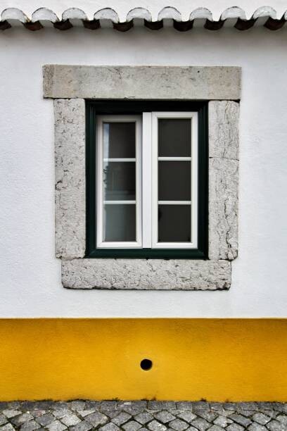 Poster Typical vintage portuguese facade with old window