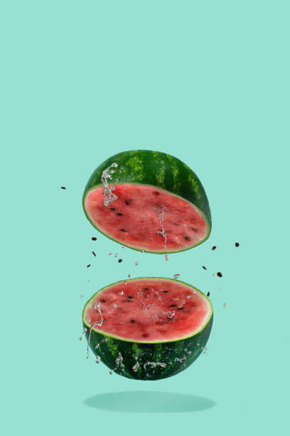 Poster Watermelon sliced flying on pastel green