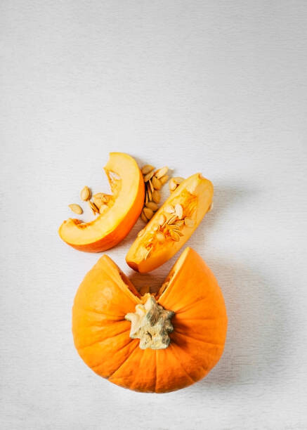 Αυτοκόλλητο Sliced pumpkin on white background