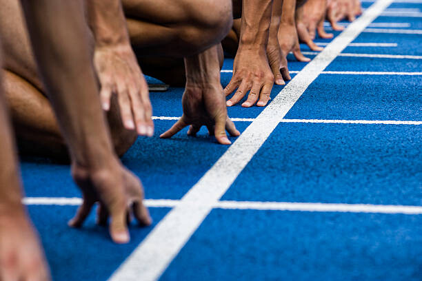 Αυτοκόλλητο Track sprinters lined up at starting