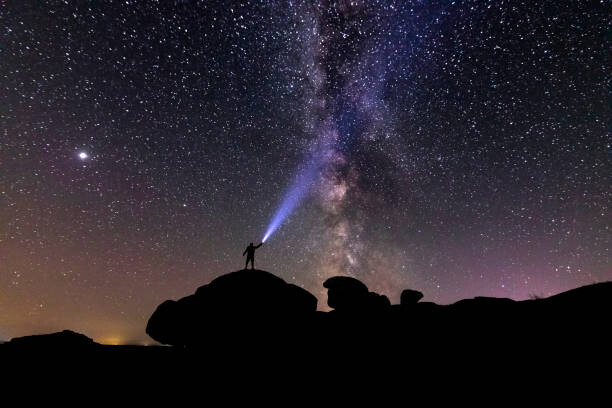 Wall Mural Man with a flashlight on the