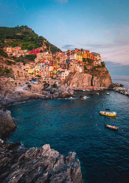 Wall Mural Manarola village on cliff rocks and