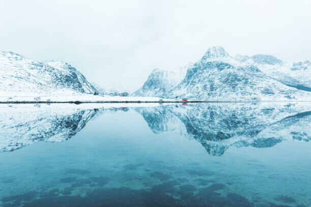 Фототапет Red houses in the snow, Lofoten Islands. Norway