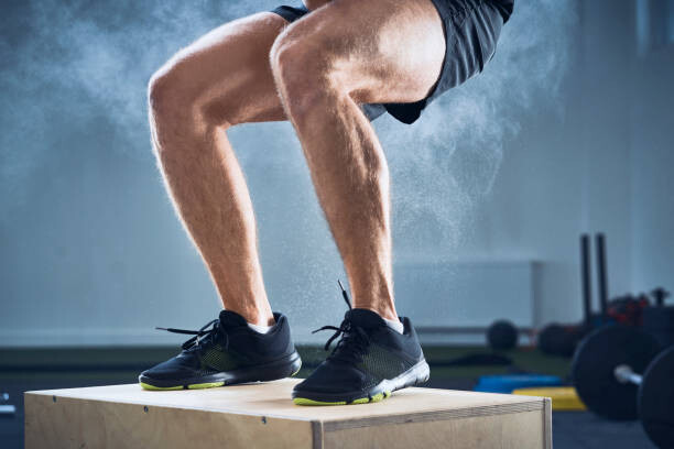 Αφίσα Closeup of man doing box jump exercise at gym