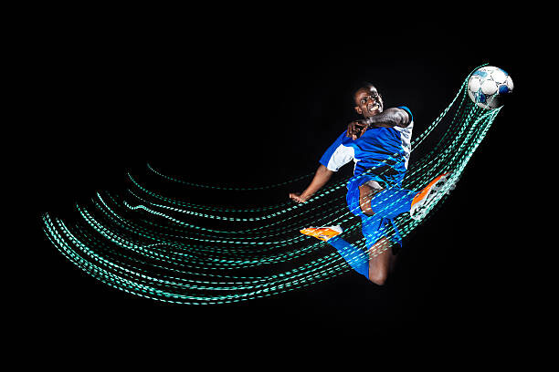 Αφίσα Football/ soccer player with lighttrace