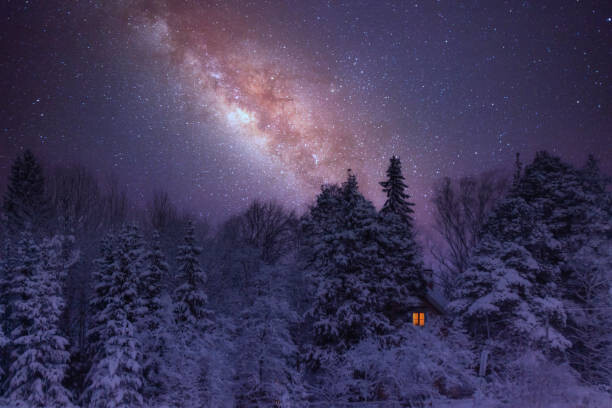 Αφίσα Glowing window in a wooden cabin
