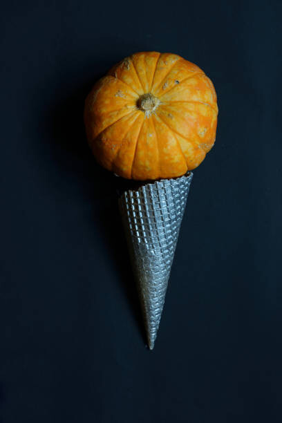 Εκτύπωση καμβά Cream cone with pumpkin. Halloween concept