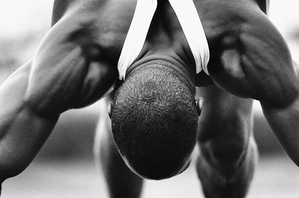 Εκτύπωση καμβά Runner bending forward, stretching