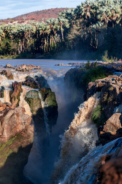 Εκτύπωση καμβά Scenic view of rocks in sea against sky,Namibia