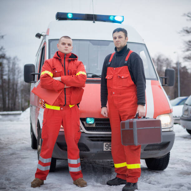 Картината върху платно Two paramedics at work